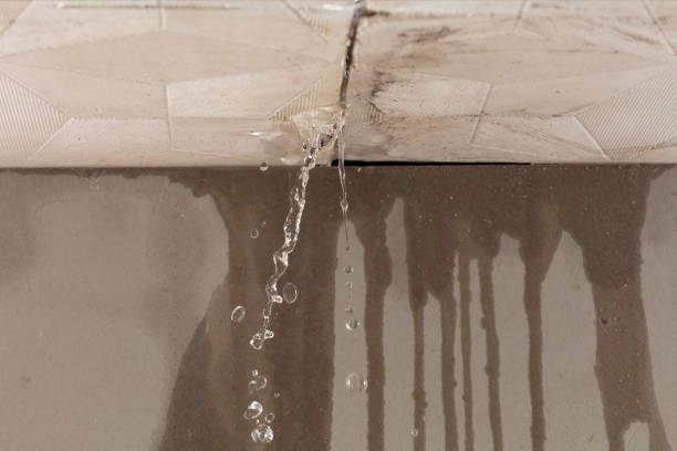 Professional Flood Damage Cleanup technician working in West Brookfield, MA